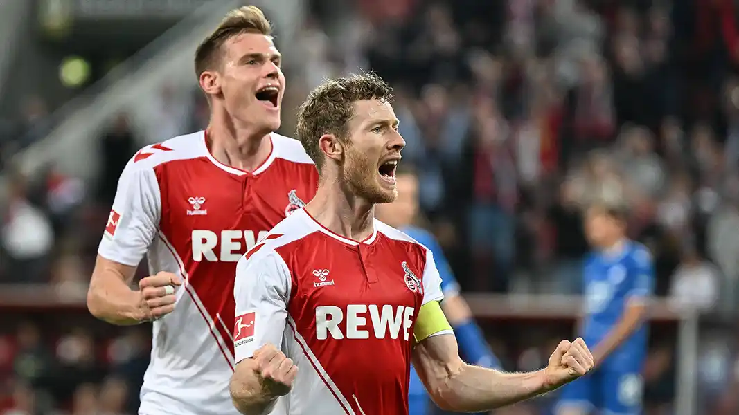 Florian Kainz (re.) und Steffen Tigges bejubeln das Tor zum 1:0 gegen Hoffenheim. (Foto: IMAGO / Jan Huebner)
